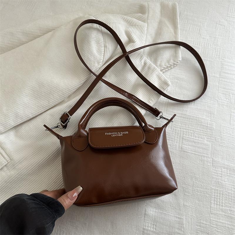 2025 new ins simple fashion messenger dumpling bag women commuter hand shoulder casual bag tide niche светло-коричневого
2025 new ins simple fashion messenger dumpling bag women commuter hand shoulder casual bag tide niche светло-коричневого