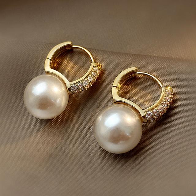 Модные романтические серьги с жемчугом, ювелирные изделия из циркония, золотые серьги-капли для женщин, темпераментные украшения для свадебной вечеринки, оптовая продажа
Модные романтические серьги с жемчугом, ювелирные изделия из циркония, золотые серьги-капли для женщин, темпераментные украшения для свадебной вечеринки, оптовая продажа