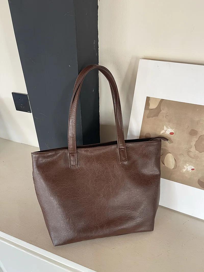 Soft Pu Leather Shoulder Bags for Women Vintage Simple Commute Ladies Shopping Bag Large Capacity Female Travel Tote Handbags кавовий
Soft Pu Leather Shoulder Bags for Women Vintage Simple Commute Ladies Shopping Bag Large Capacity Female Travel Tote Handbags кавовий