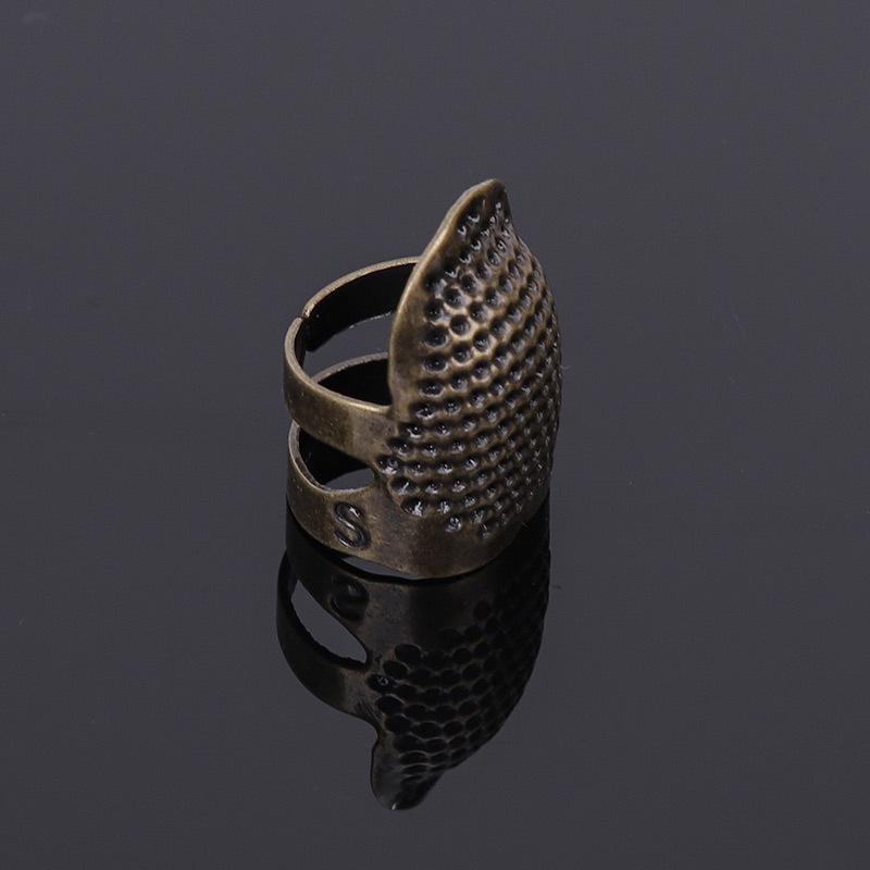 Adjustable Copper Thimble: Finger Protector & Sewing Tool
Adjustable Copper Thimble: Finger Protector & Sewing Tool