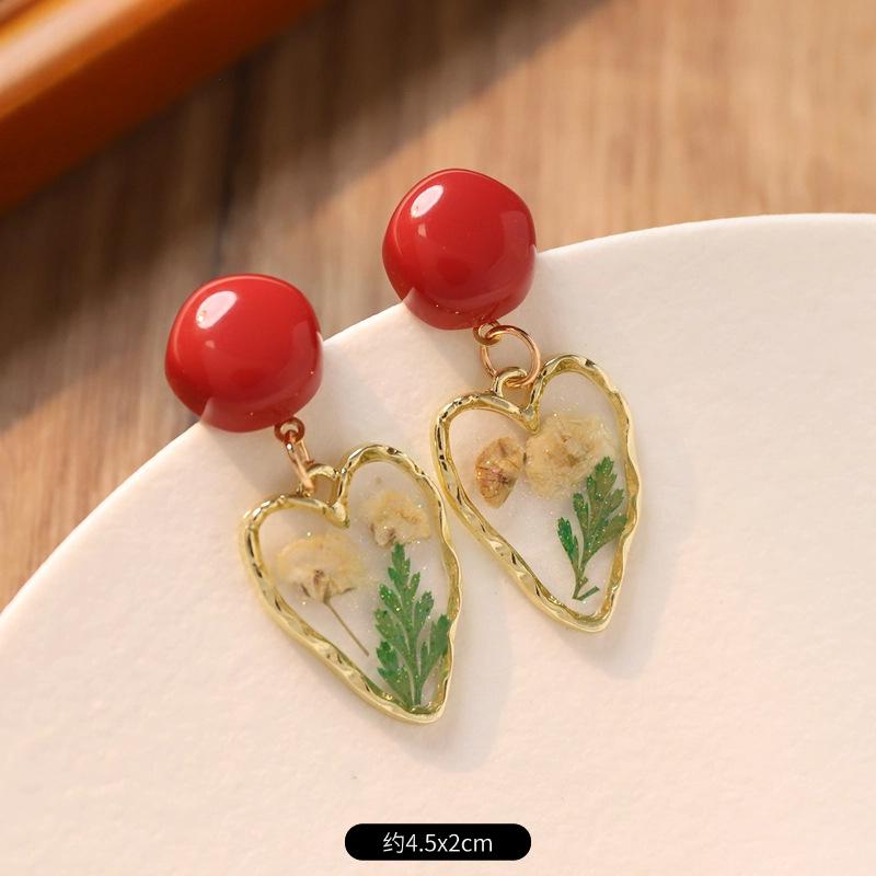 Retro contrasting plant dried flower earrings pastoral immortal flower stud earrings vacation style niche high-end earrings women
Retro contrasting plant dried flower earrings pastoral immortal flower stud earrings vacation style niche high-end earrings women