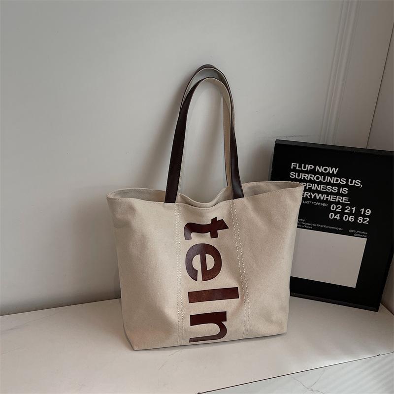 Korean Shoulder Bag Large Capacity Canvas Tote Bag for Women with Letter Print Comfortable and Versatile Texture Storage Bags хакі
Korean Shoulder Bag Large Capacity Canvas Tote Bag for Women with Letter Print Comfortable and Versatile Texture Storage Bags хакі