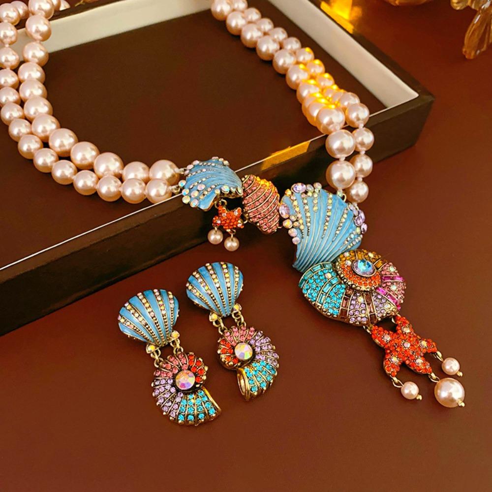 Luxury Crystal Conch Necklace Double-layer Shell Conch Earrings Pearl Beaded Necklace Party Earrings
Luxury Crystal Conch Necklace Double-layer Shell Conch Earrings Pearl Beaded Necklace Party Earrings