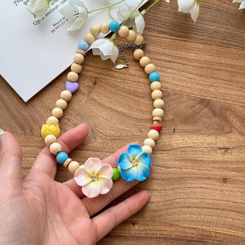 Acrylic dopamine wood beads flower necklace vacation wind sweet collarbone chain fashion personality temperament jewelry
Acrylic dopamine wood beads flower necklace vacation wind sweet collarbone chain fashion personality temperament jewelry