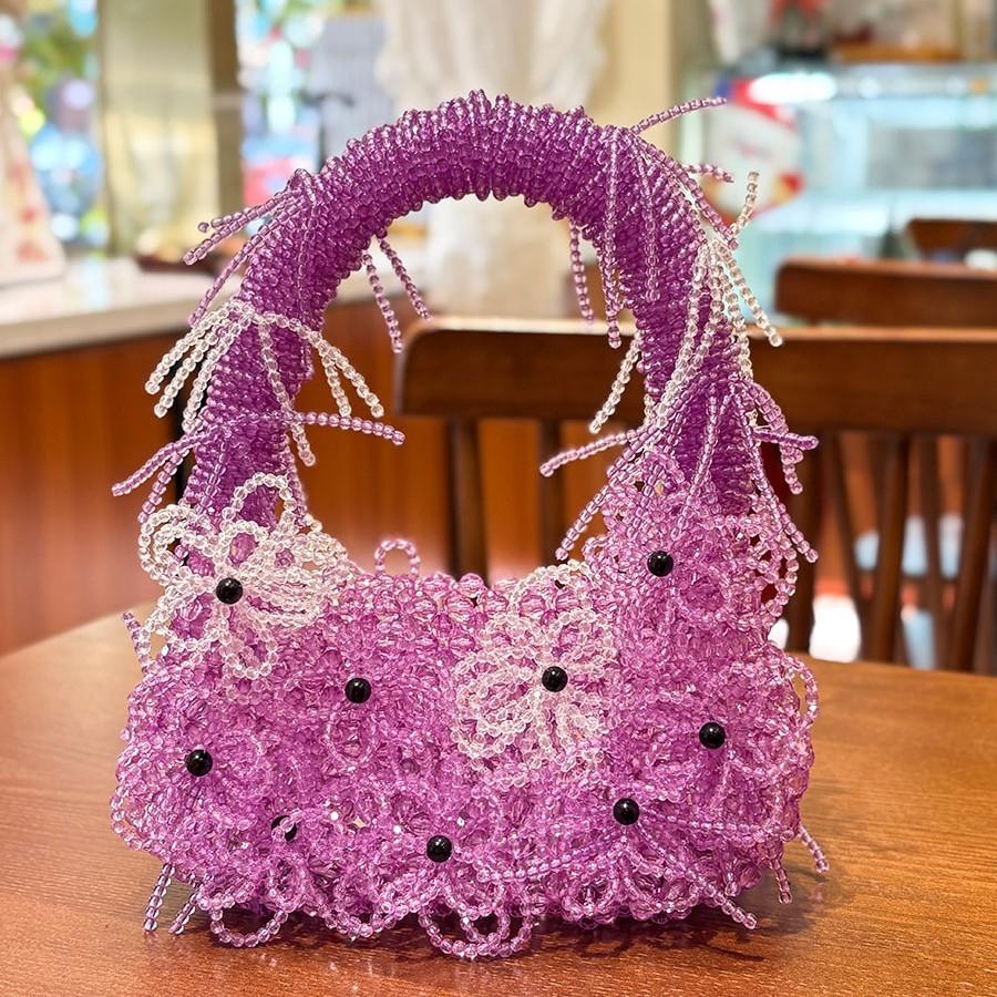 Sweet and playful handmade beaded flower woven bag creative personality casual lipstick change handbag
Sweet and playful handmade beaded flower woven bag creative personality casual lipstick change handbag