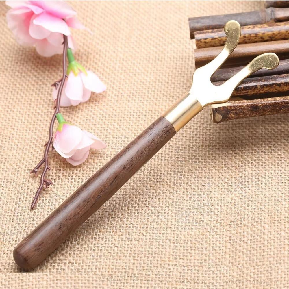 Wood Copper Tea Kettle Cover Fork 17cm Kung Fu Tea Tools New Teapot Lid Clip for Cast Iron Teapot 1pc
Wood Copper Tea Kettle Cover Fork 17cm Kung Fu Tea Tools New Teapot Lid Clip for Cast Iron Teapot 1pc
