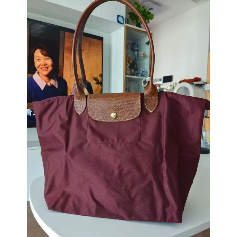 Longxiang bag Zhou embroidery tote bag handbag dumpling bag splicing commute large capacity short handle small
Longxiang bag Zhou embroidery tote bag handbag dumpling bag splicing commute large capacity short handle small