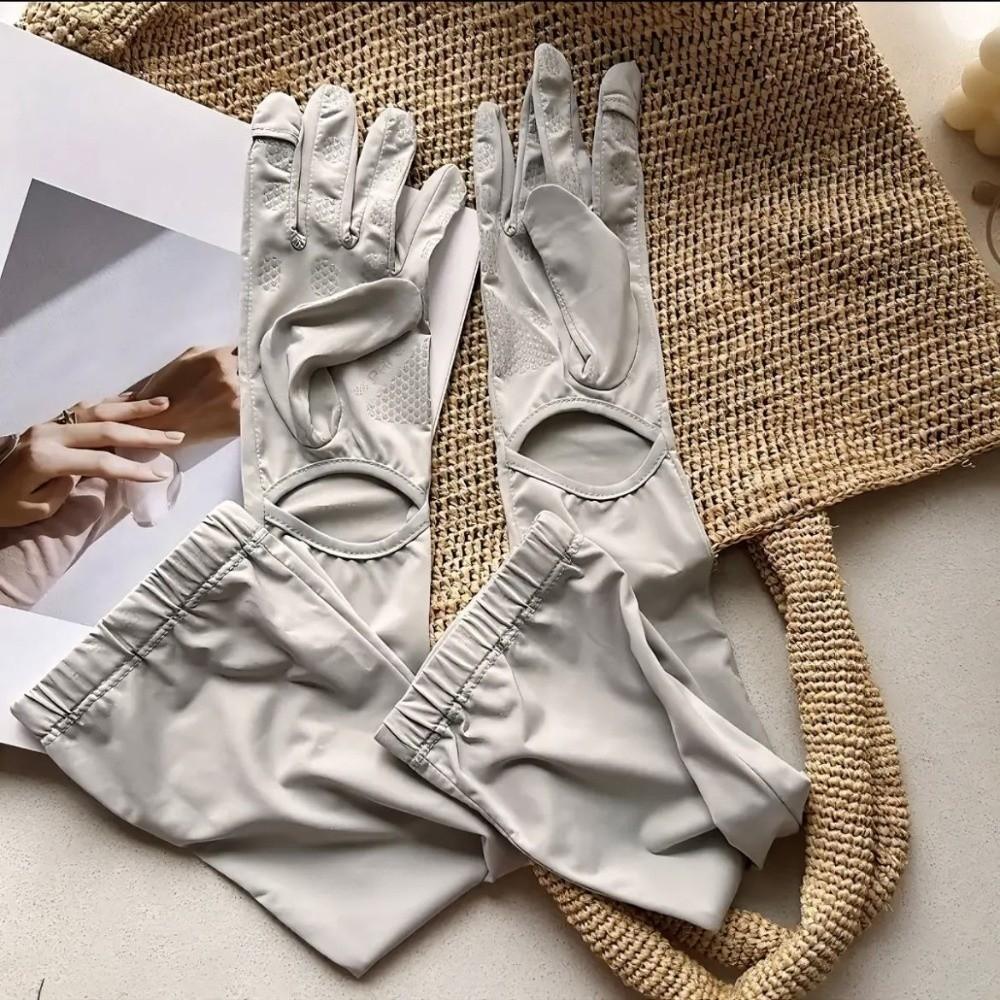 New Dopamine Sunscreen Gloves Ice Silk Thin Arm Protector Sleeves UV Protection Non-Slip Gloves світло-сірого кольору
New Dopamine Sunscreen Gloves Ice Silk Thin Arm Protector Sleeves UV Protection Non-Slip Gloves світло-сірого кольору