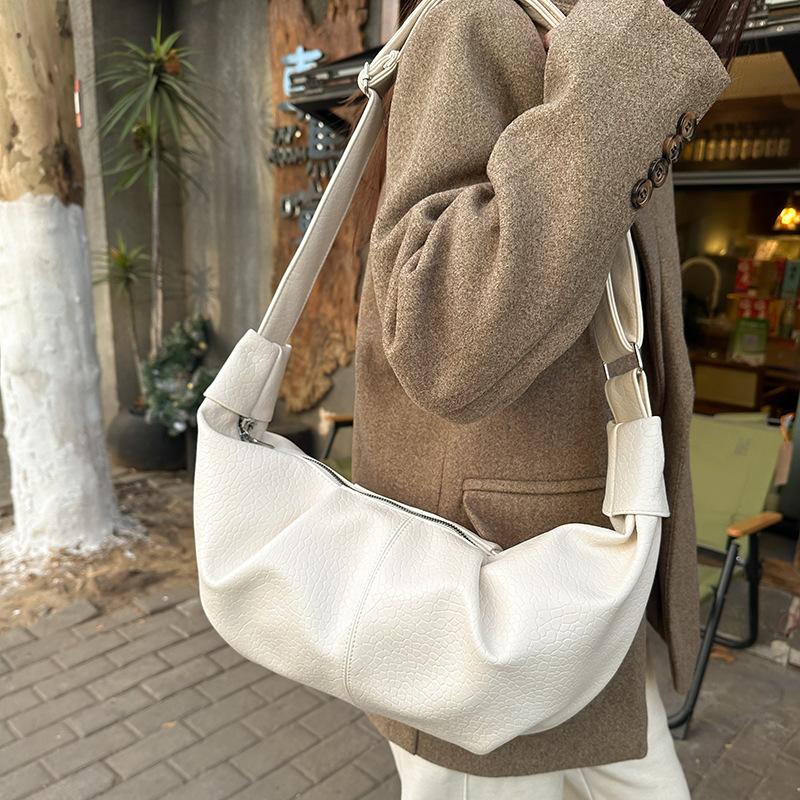 High-end soft leather niche dumpling bag for women2026New Fashiable Korean Casual Large Capacity Crossbody Shoulder Bag білий
High-end soft leather niche dumpling bag for women2026New Fashiable Korean Casual Large Capacity Crossbody Shoulder Bag білий