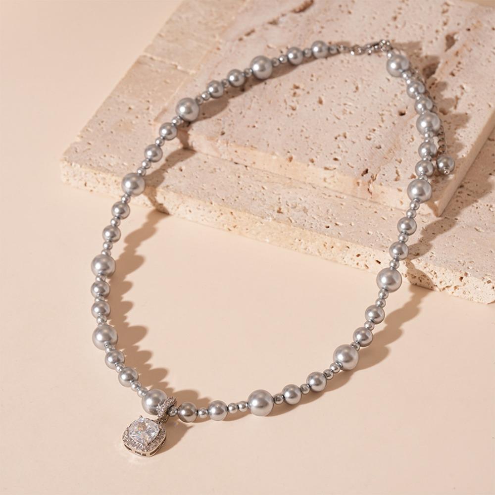 Квадратный чокер из искусственного жемчуга Элегантные ожерелья из бусин Модное ожерелье с подвеской из циркона Женщины серый
Квадратный чокер из искусственного жемчуга Элегантные ожерелья из бусин Модное ожерелье с подвеской из циркона Женщины серый