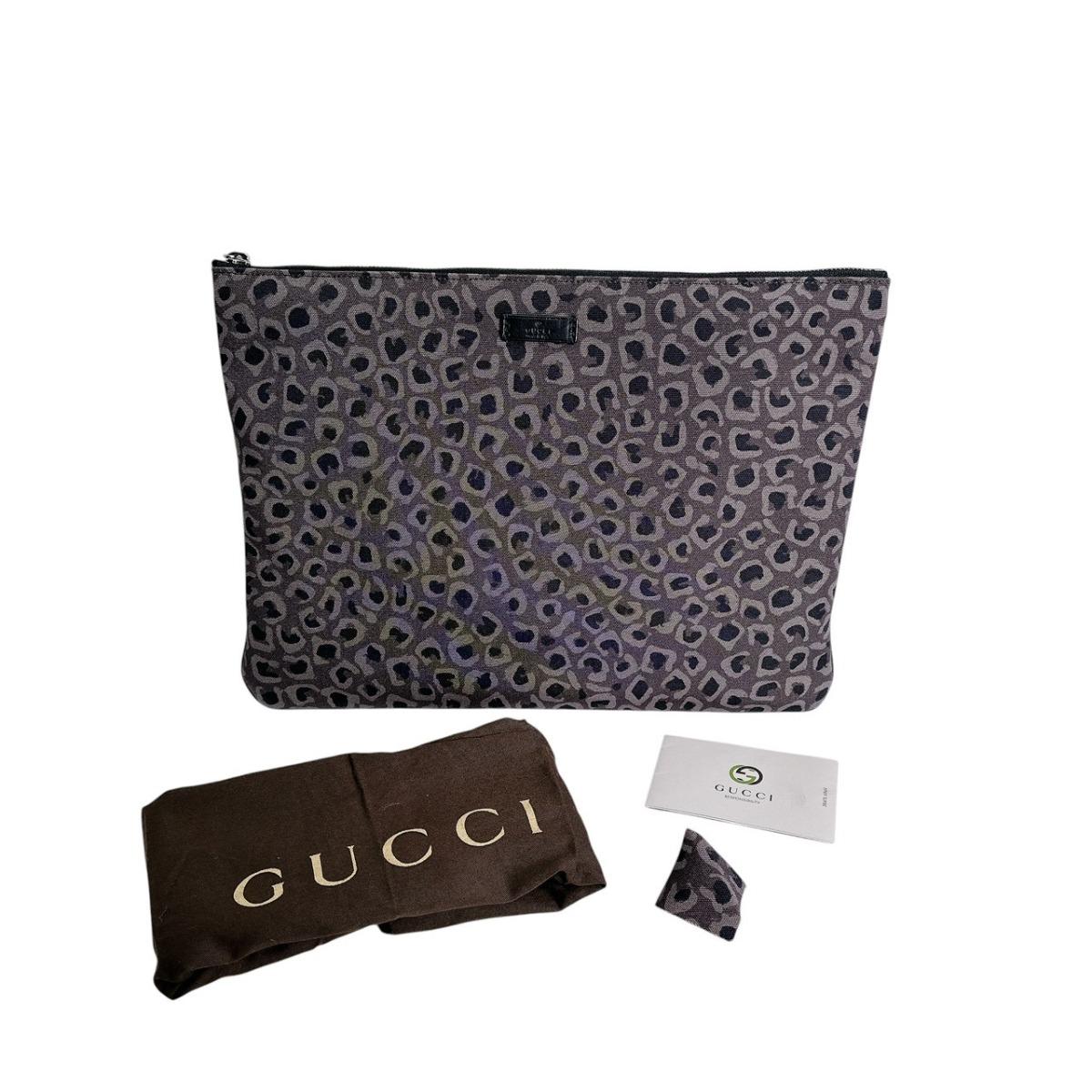 GUCCI Leopard print Clutch bag Hand Pouch gray Canvas unisex Used
GUCCI Leopard print Clutch bag Hand Pouch gray Canvas unisex Used