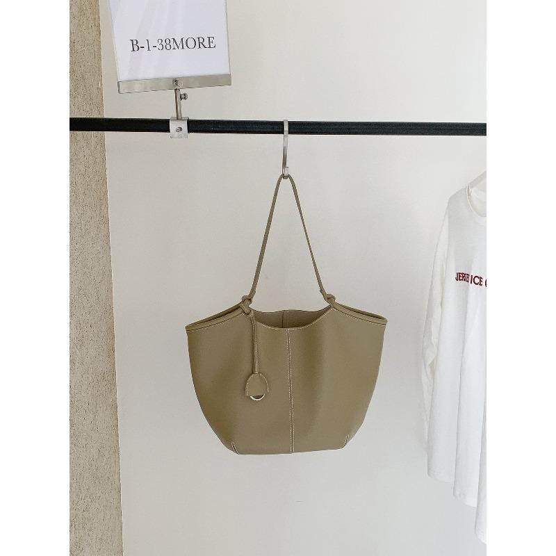 Summer new tote bag large capacity female solid color versatile commuter bag car line design portable shoulder bag хаки
Summer new tote bag large capacity female solid color versatile commuter bag car line design portable shoulder bag хаки
