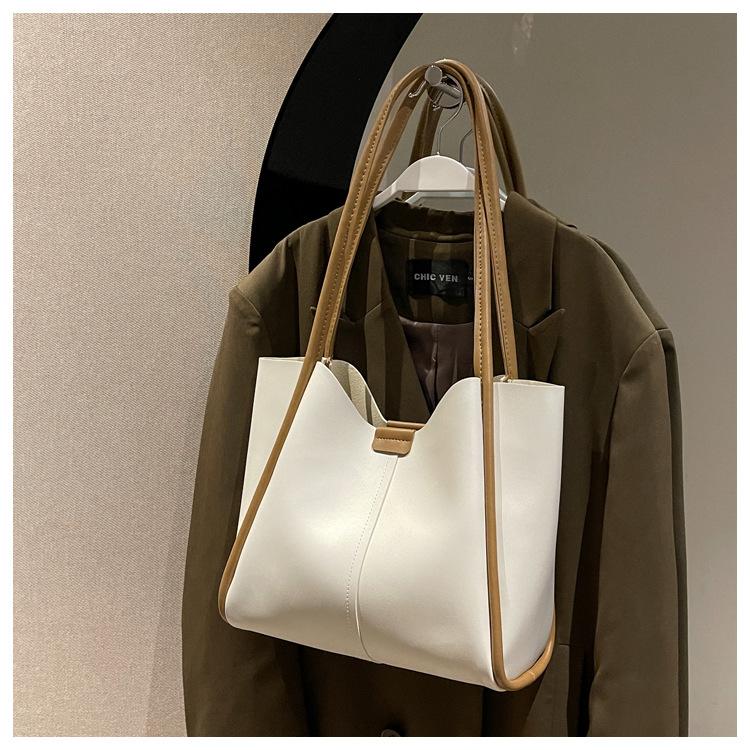 Сумка большой вместимости для мамы и ребенка, универсальная сумка-подмышка для通勤, женская новая модная сумка-тоут, ретро сумка через плечо белый
Сумка большой вместимости для мамы и ребенка, универсальная сумка-подмышка для通勤, женская новая модная сумка-тоут, ретро сумка через плечо белый