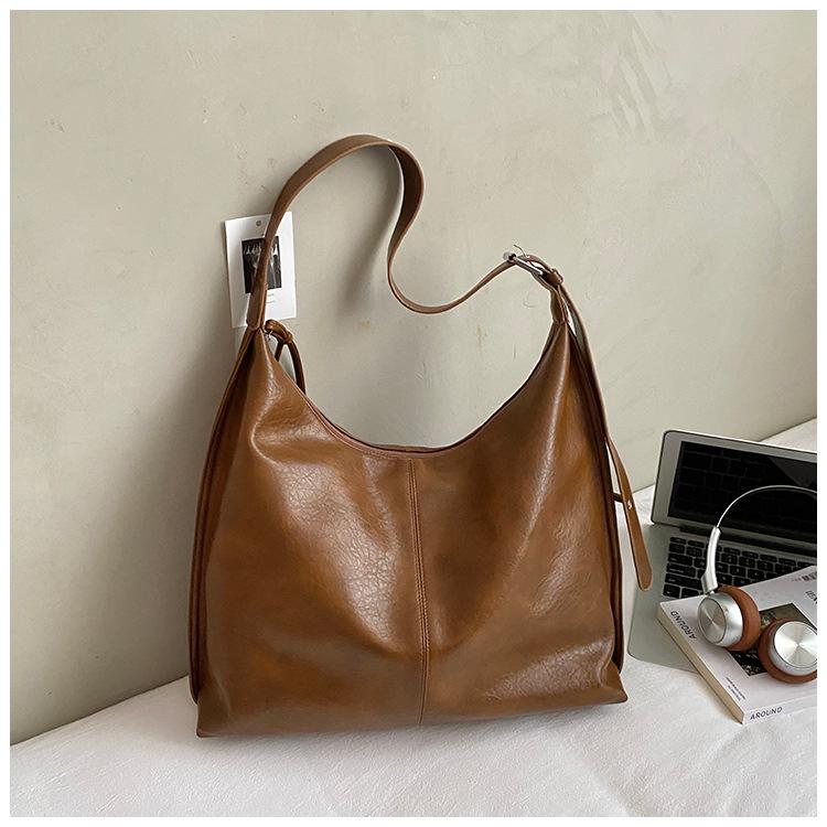 Вместительная универсальная сумка через плечо женская 2025 осень новый тренд корейская версия мода зарубежный стиль повседневная сумка-тоут под мышкой коричневый
Вместительная универсальная сумка через плечо женская 2025 осень новый тренд корейская версия мода зарубежный стиль повседневная сумка-тоут под мышкой коричневый