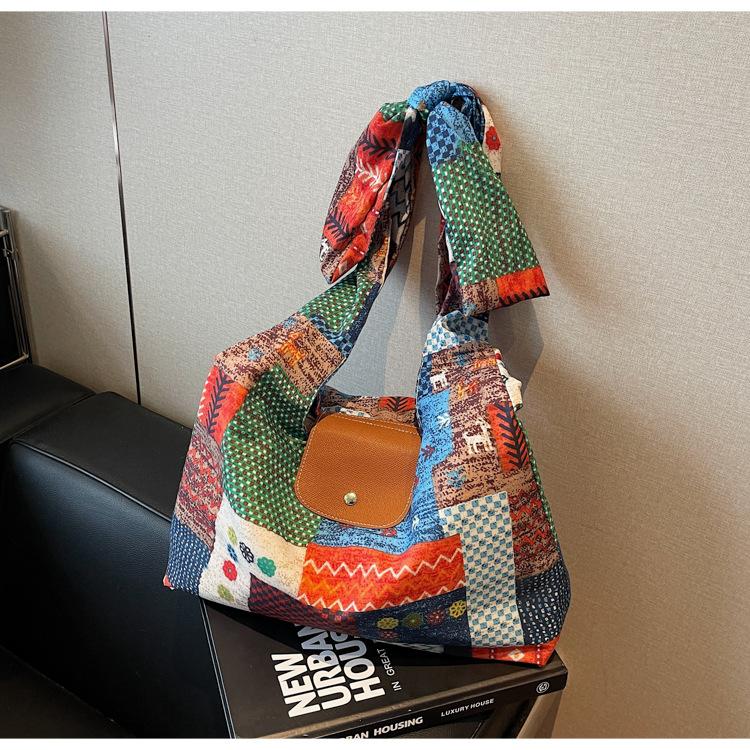 New women s canvas niche light luxury premium texture shoulder armpit large capacity lazy wind tote bag помаранчевий
New women s canvas niche light luxury premium texture shoulder armpit large capacity lazy wind tote bag помаранчевий