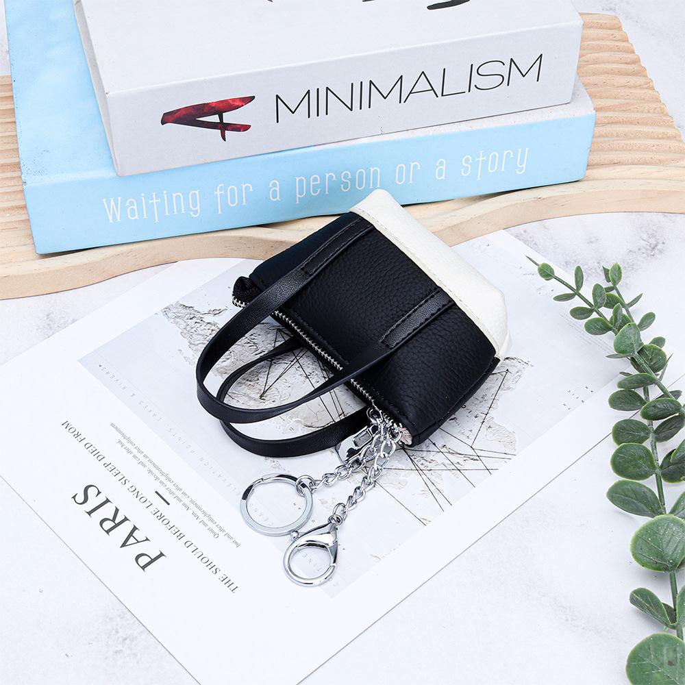 Leather mini portable change bag women s new fashion compact garden bag first layer cowhide coin lipstick key bag чёрный
Leather mini portable change bag women s new fashion compact garden bag first layer cowhide coin lipstick key bag чёрный