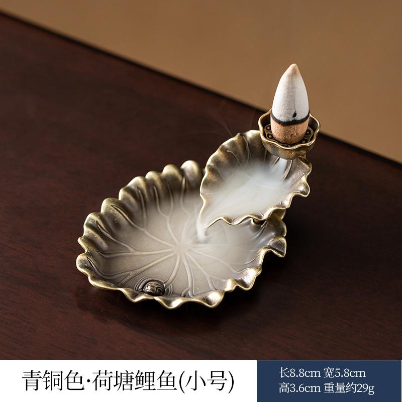 Lotus Leaf Backflow Incense Burner Ceramic Small Size Incense Holder with Hollow Design for Aromatherapy and Home Decoration One Size
Lotus Leaf Backflow Incense Burner Ceramic Small Size Incense Holder with Hollow Design for Aromatherapy and Home Decoration One Size