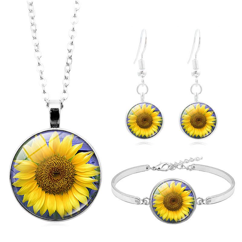 Sunflower Jewelry Set: Silver Necklace, Bracelet, and Stud Earrings - Creative European & American Design
Sunflower Jewelry Set: Silver Necklace, Bracelet, and Stud Earrings - Creative European & American Design
