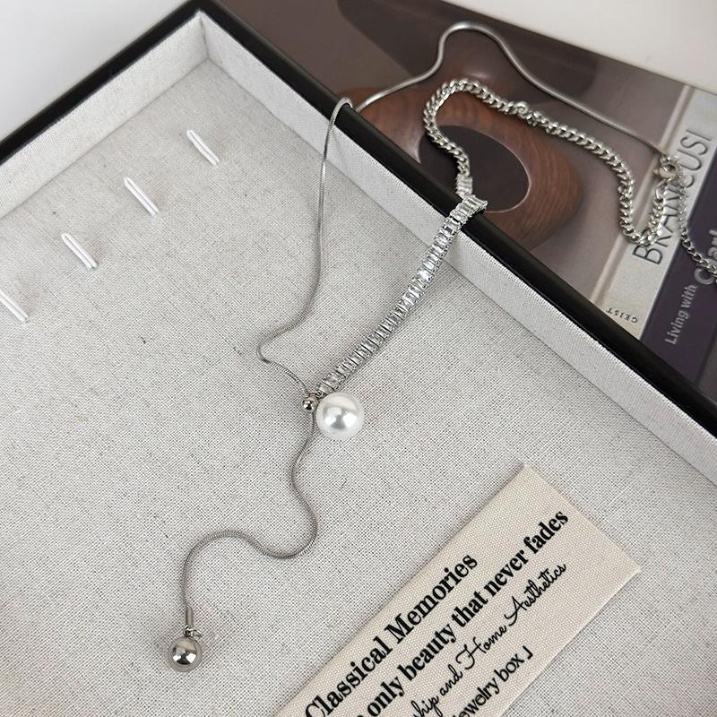 Pullable flash diamond pearl long necklace light luxury niche new design sense fashion collarbone chain neck chain tide
Pullable flash diamond pearl long necklace light luxury niche new design sense fashion collarbone chain neck chain tide