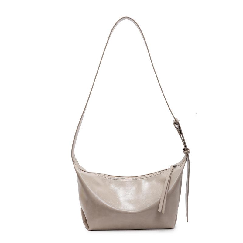 Fashion and popular casual solid color casual simple portable underarm shoulder bag new dumpling bag
Fashion and popular casual solid color casual simple portable underarm shoulder bag new dumpling bag