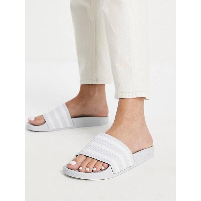 adidas Originals Adilette sliders in pale blue
adidas Originals Adilette sliders in pale blue