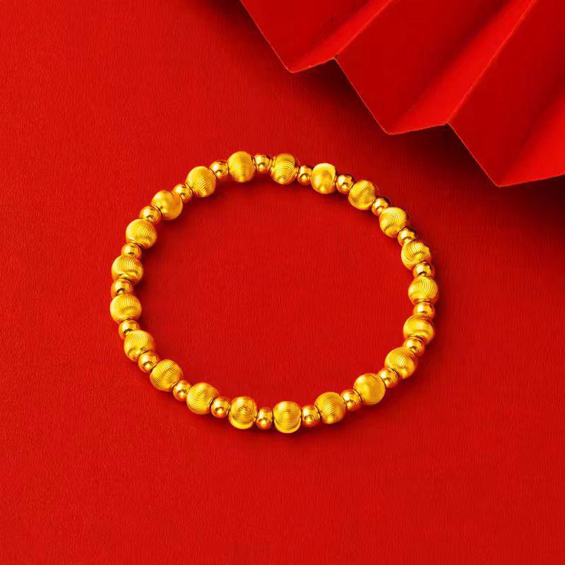 Cat s Eye Round Bead Bracelet: Vietnamese Sand Gold String with Ancient-Style Gold and Lucky Beads – High-End Fashion Jewelry.
Cat s Eye Round Bead Bracelet: Vietnamese Sand Gold String with Ancient-Style Gold and Lucky Beads – High-End Fashion Jewelry.