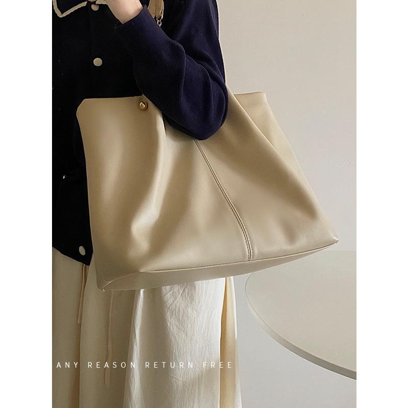 Bag 2024 new soft leather tote bag large capacity female niche senior sense college student class portable shoulder bag
Bag 2024 new soft leather tote bag large capacity female niche senior sense college student class portable shoulder bag