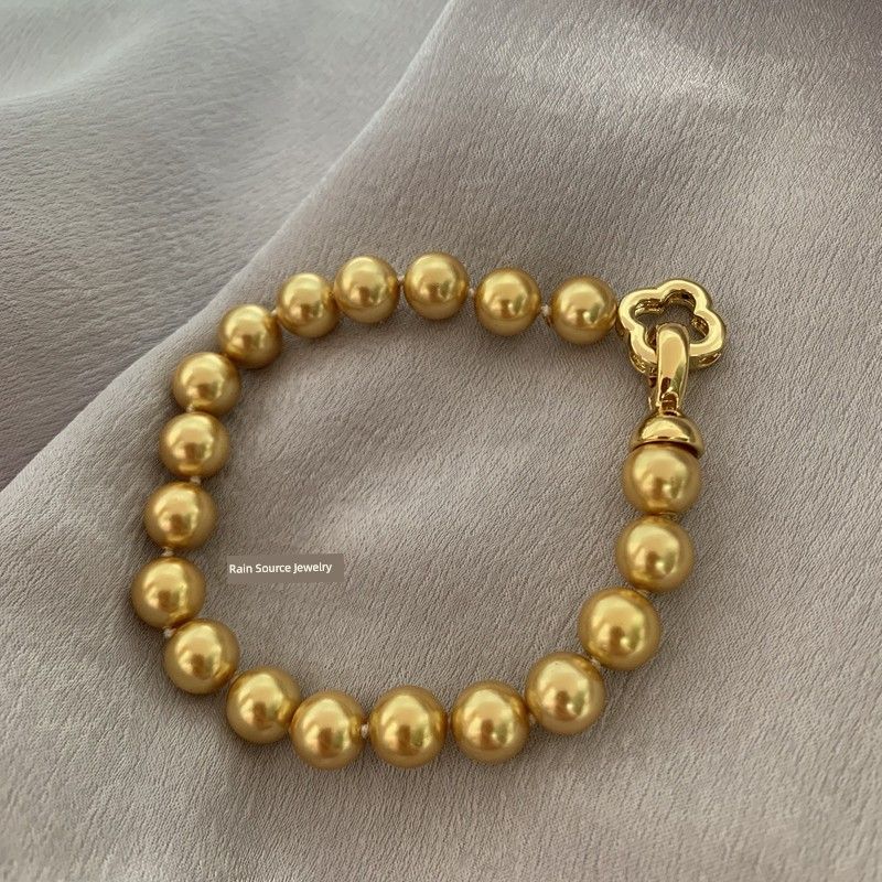 Nanyang Mother Shell Pearl Thick Gold Tea Gold Perfect Circle Strong Light Bracelet Fashion Style Classic Luxury to Give Mom for Girlfriend Tea Gold 7.5-8mm
Nanyang Mother Shell Pearl Thick Gold Tea Gold Perfect Circle Strong Light Bracelet Fashion Style Classic Luxury to Give Mom for Girlfriend Tea Gold 7.5-8mm