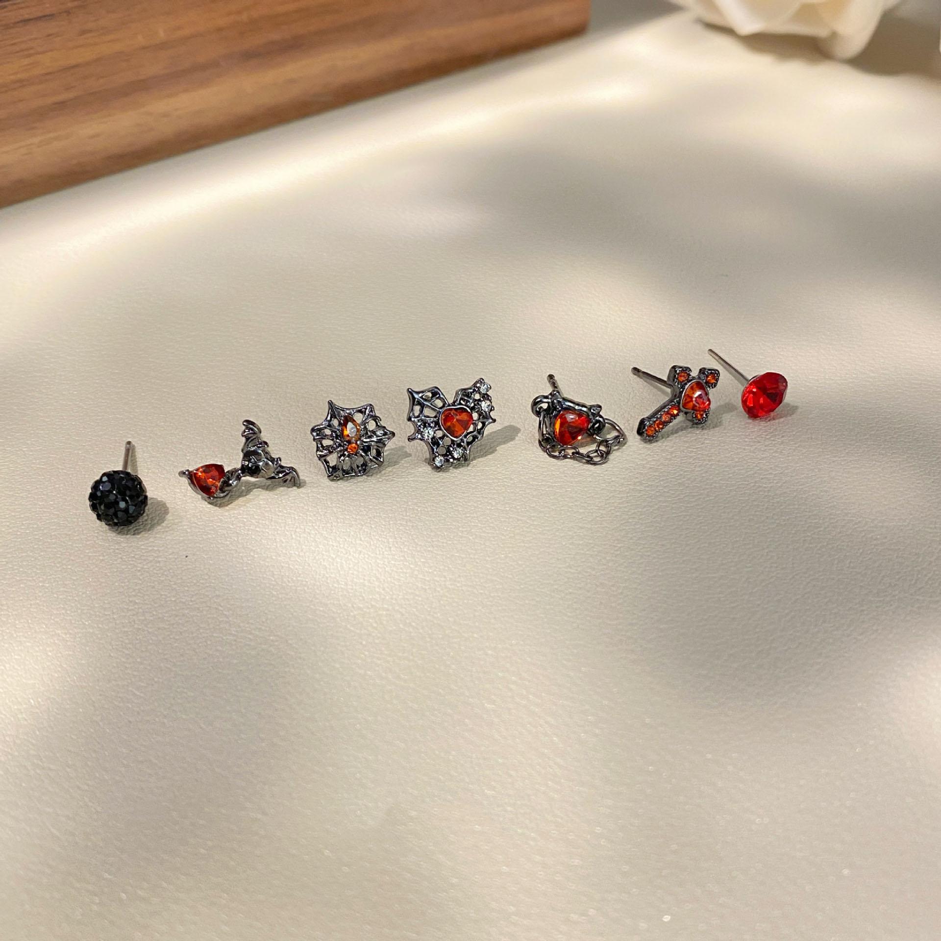 Simple spider web cross love chain red zircon earrings set fashion personality punk seven piece jewelry
Simple spider web cross love chain red zircon earrings set fashion personality punk seven piece jewelry