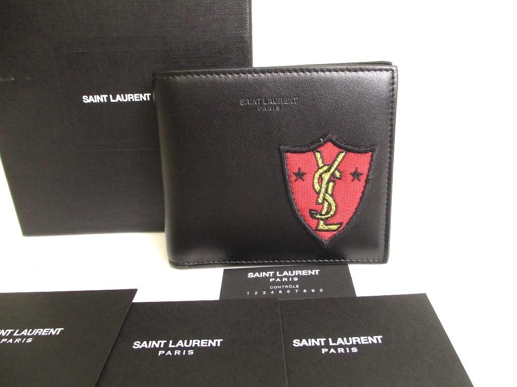 Автентичний гаманець Saint Laurent Paris YSL із чорної шкіри в стилі печворк із двома купюрами №a018 відремонтований
Автентичний гаманець Saint Laurent Paris YSL із чорної шкіри в стилі печворк із двома купюрами №a018 відремонтований