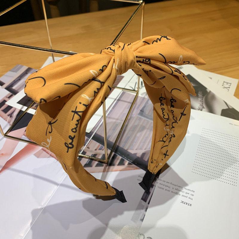 Korean Style Big Bow Non-Slip Headband with Letter Design
Korean Style Big Bow Non-Slip Headband with Letter Design
