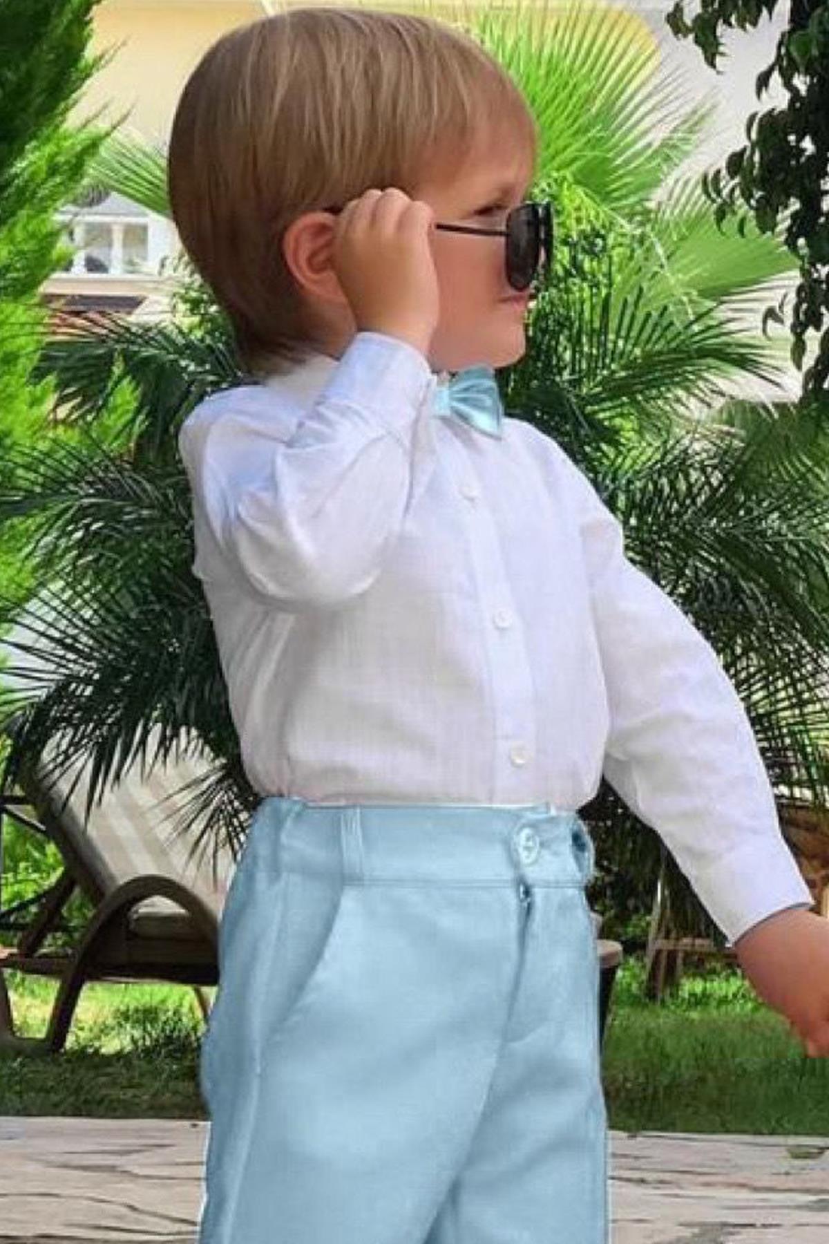 Erkek Çocuk Papyonlu Mavi Şortlu Takım
Erkek Çocuk Papyonlu Mavi Şortlu Takım