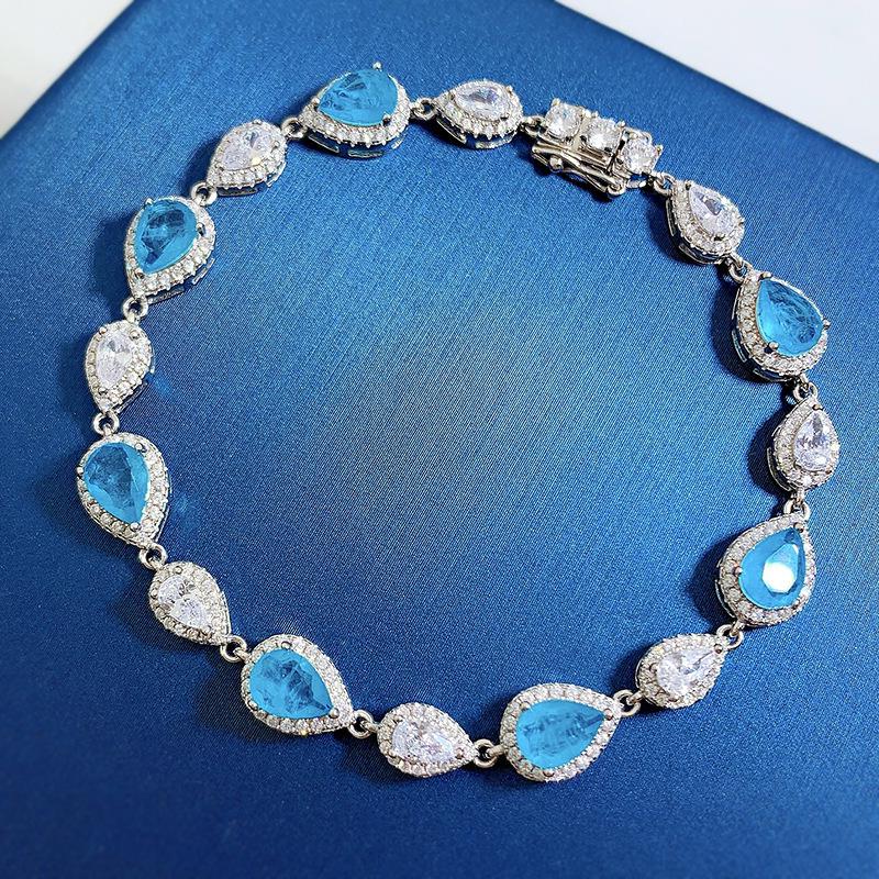 Hui Zhi Yi 2023 925 Silver Simulated Paraiba Bracelet 5x7mm 1 Carat - Fashionable and High-End Jewelry. 18cm
Hui Zhi Yi 2023 925 Silver Simulated Paraiba Bracelet 5x7mm 1 Carat - Fashionable and High-End Jewelry. 18cm