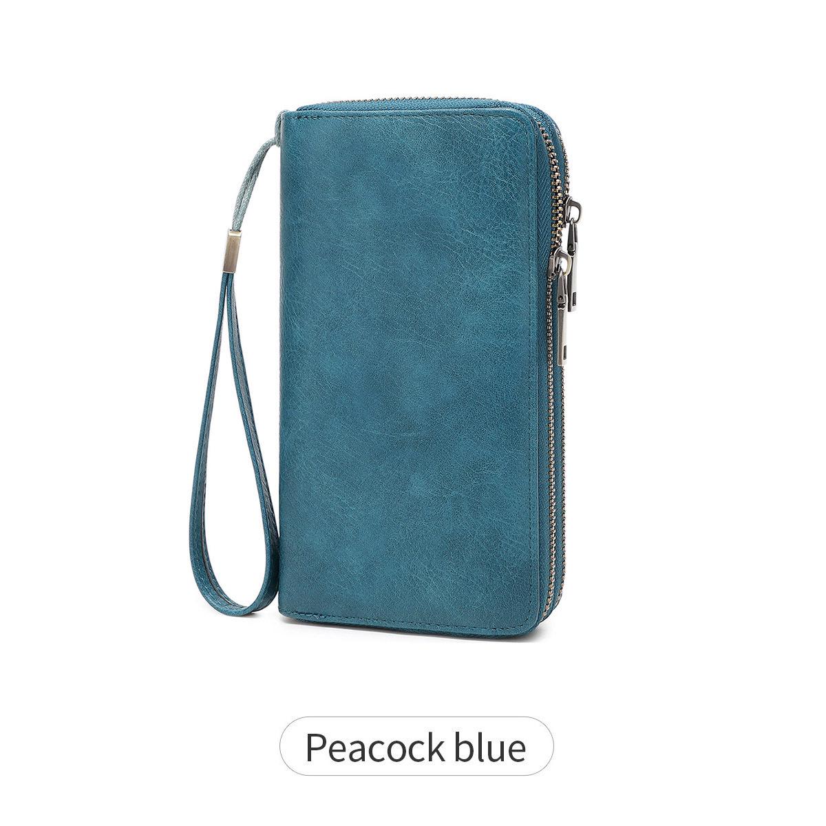 Men s RFID Business Wallet with Double Zipper - Retro, Fashionable, Large Capacity Women s Clutch peacock синього кольору
Men s RFID Business Wallet with Double Zipper - Retro, Fashionable, Large Capacity Women s Clutch peacock синього кольору