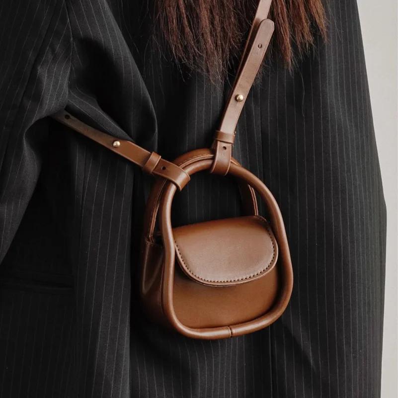 New Fashion Designer Mini Shoulder Bags Solid Color Black Brown Pu Leather Cross Body Bags Earphone Lipstick Small Storage Bags
New Fashion Designer Mini Shoulder Bags Solid Color Black Brown Pu Leather Cross Body Bags Earphone Lipstick Small Storage Bags