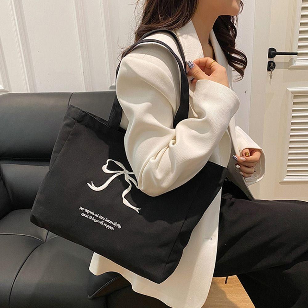 Zipper Bow Shoulder Bag Solid Color Canvas Handbag Casual Embroidery Bow Tote Bag Students чорний
Zipper Bow Shoulder Bag Solid Color Canvas Handbag Casual Embroidery Bow Tote Bag Students чорний