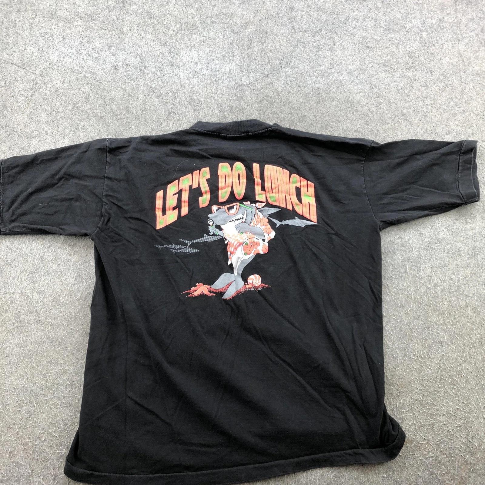 Vintage Poly Tees Hawaii Shirt Mens XL Black Let s Do Lunch Shark Graphic Tee S
Vintage Poly Tees Hawaii Shirt Mens XL Black Let s Do Lunch Shark Graphic Tee S