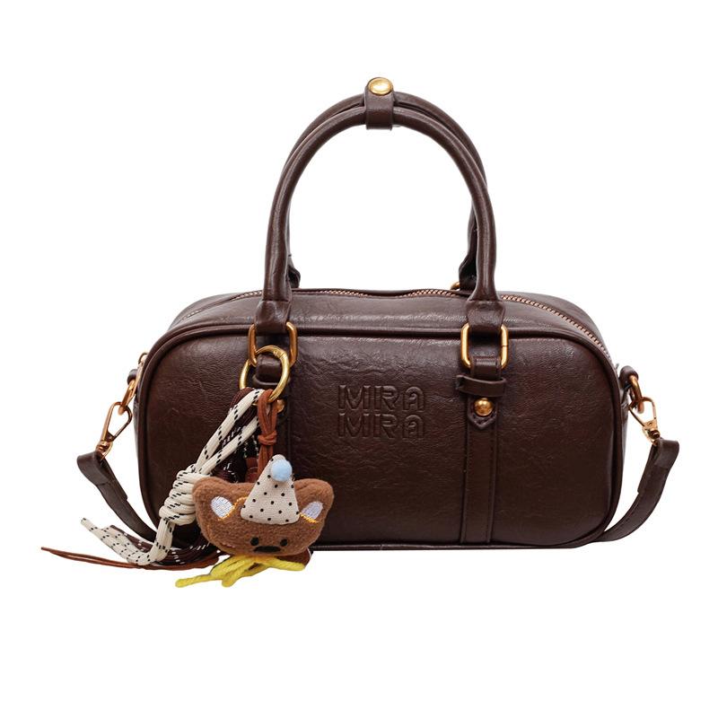 Handbag bag women s autumn and winter versatile bowling bag new retro shoulder messenger bag commuter pillow bag No pendant model темно-коричневого кольору
Handbag bag women s autumn and winter versatile bowling bag new retro shoulder messenger bag commuter pillow bag No pendant model темно-коричневого кольору