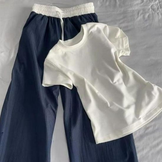 Korean Chic Women s White T-Shirt & Navy Patchwork Wide-Leg Pants Set S (Recommended under 90 lbs)
Korean Chic Women s White T-Shirt & Navy Patchwork Wide-Leg Pants Set S (Recommended under 90 lbs)