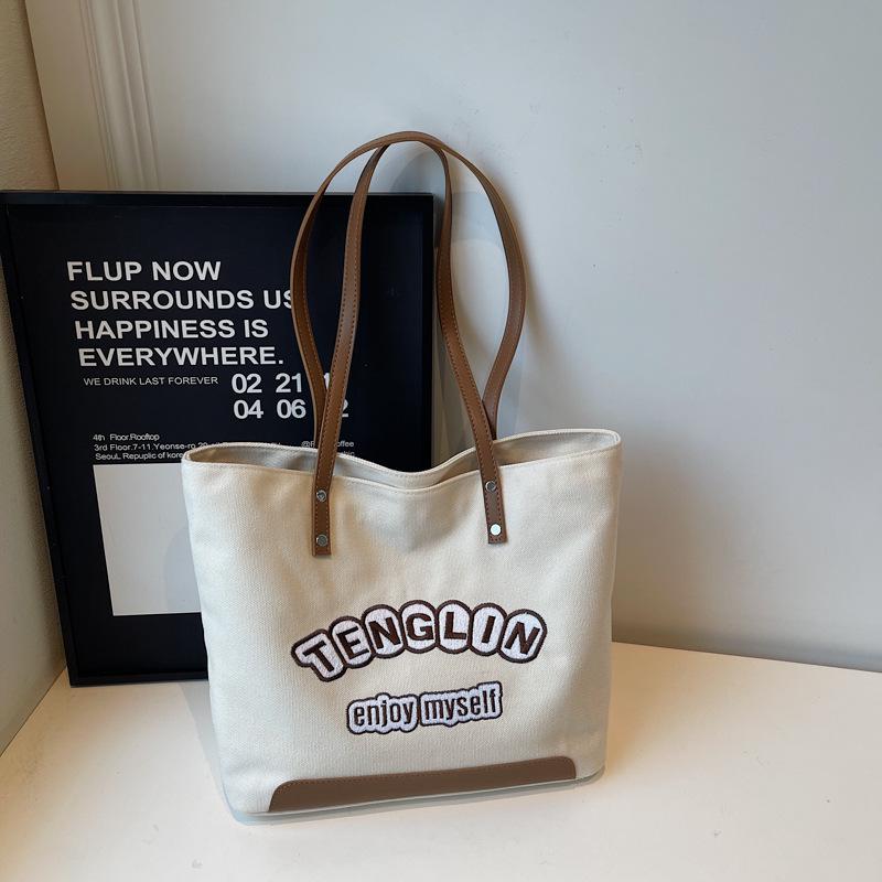 Harajuku Embroidered Letter Canvas Handbag - Versatile, Large Capacity, Fashionable Student Shoulder Bag вершковий/білий
Harajuku Embroidered Letter Canvas Handbag - Versatile, Large Capacity, Fashionable Student Shoulder Bag вершковий/білий