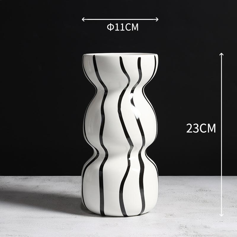 Modern Nordic Black White Striped Ceramic Vase Home Decor for Hotel Apartment Showroom
Modern Nordic Black White Striped Ceramic Vase Home Decor for Hotel Apartment Showroom