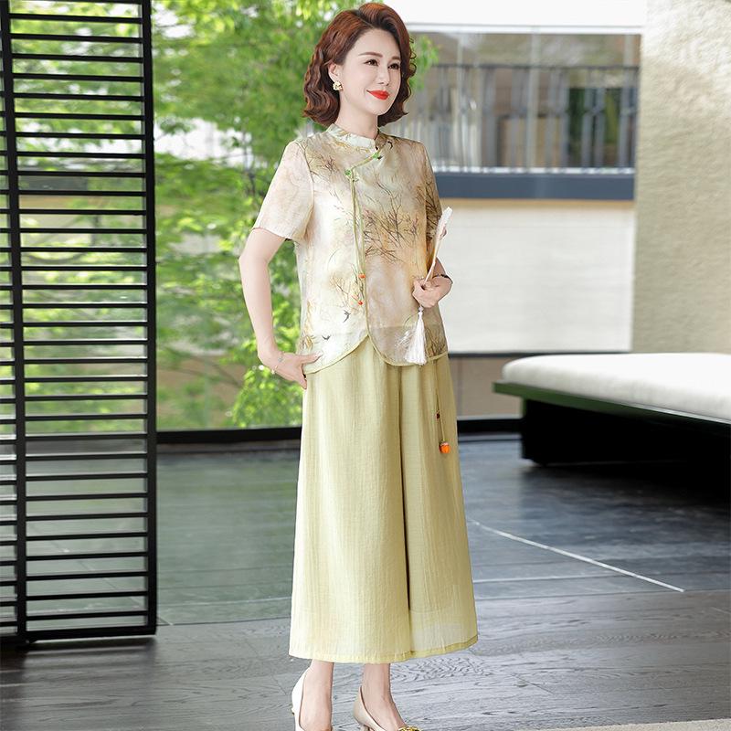 Chic Summer Cheongsam Two-Piece Set for Moms: Stylish Top and Pants for Middle-Aged and Elderly Women 5XL -- recommended for 150-160 jin зелений
Chic Summer Cheongsam Two-Piece Set for Moms: Stylish Top and Pants for Middle-Aged and Elderly Women 5XL -- recommended for 150-160 jin зелений