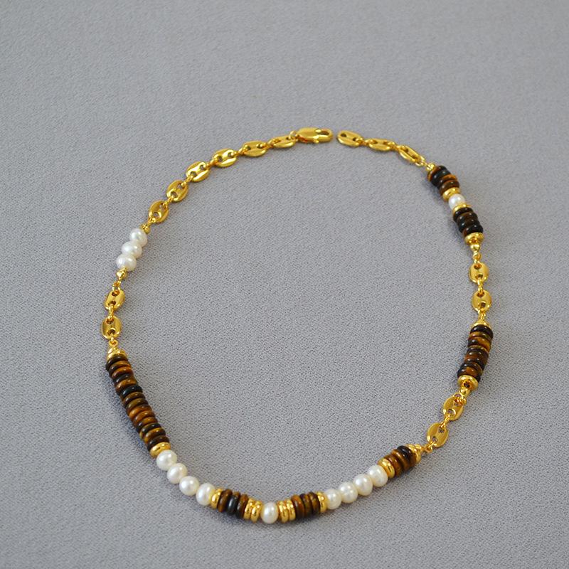 European and American Retro Art Freshwater Pearl Tiger Eye Stone Pig Nose Chain Maillard Brass Gold-plated Asymmetrical Necklace
European and American Retro Art Freshwater Pearl Tiger Eye Stone Pig Nose Chain Maillard Brass Gold-plated Asymmetrical Necklace