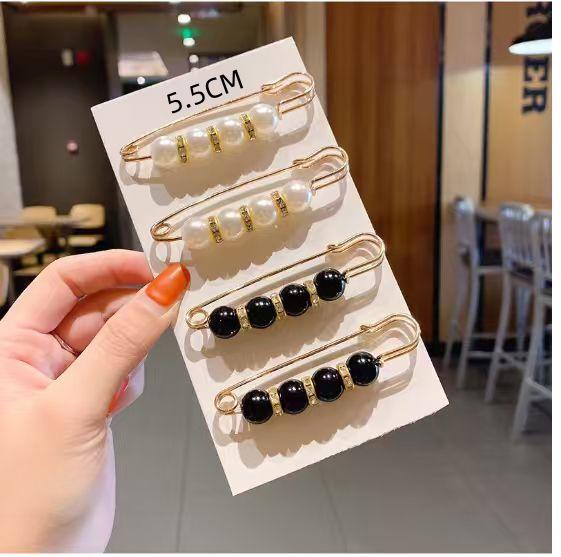 Брошка-затискач для талії з імітацією перлів - Аксесуар для одягу, що захищає від оголення
Брошка-затискач для талії з імітацією перлів - Аксесуар для одягу, що захищає від оголення