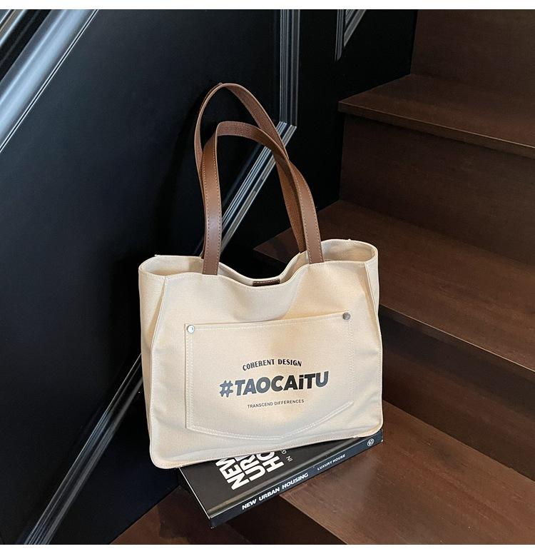 Large capacity canvas bag women s new shoulder tote bag underarm bag work cloth bag student tote bag
Large capacity canvas bag women s new shoulder tote bag underarm bag work cloth bag student tote bag