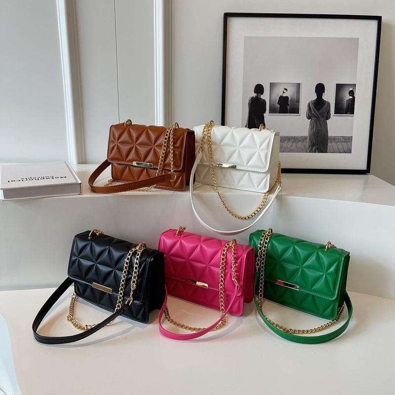 Embroidery thread indentation plaid new trendy summer simple fashion chain portable shoulder small square bag women коричневий
Embroidery thread indentation plaid new trendy summer simple fashion chain portable shoulder small square bag women коричневий