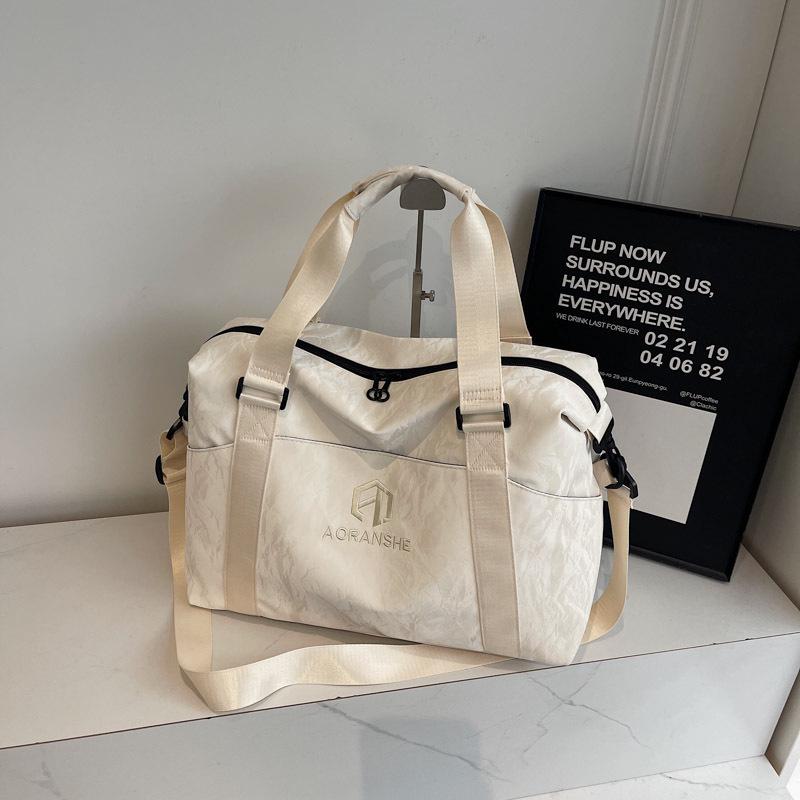 Women s Travel Bag: Fashionable, Multifunctional, Large-Capacity with Dry/Wet Separation for Business Trips & Fitness. 43x30x18 cm
Women s Travel Bag: Fashionable, Multifunctional, Large-Capacity with Dry/Wet Separation for Business Trips & Fitness. 43x30x18 cm