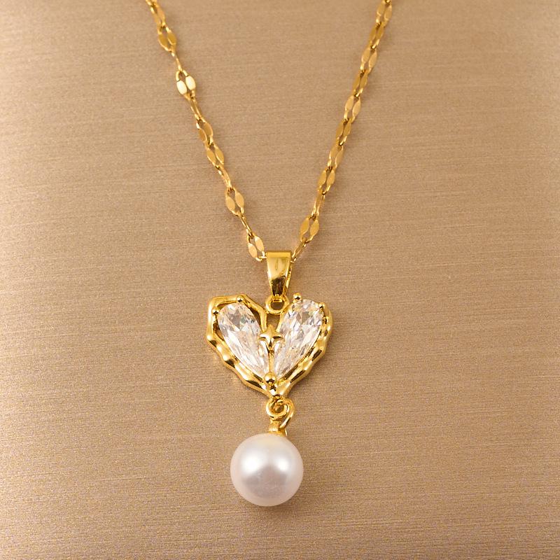 Модное ожерелье в виде сердца любви, украшенное сверкающими цирконами и жемчугом с кисточками 45cm
Модное ожерелье в виде сердца любви, украшенное сверкающими цирконами и жемчугом с кисточками 45cm