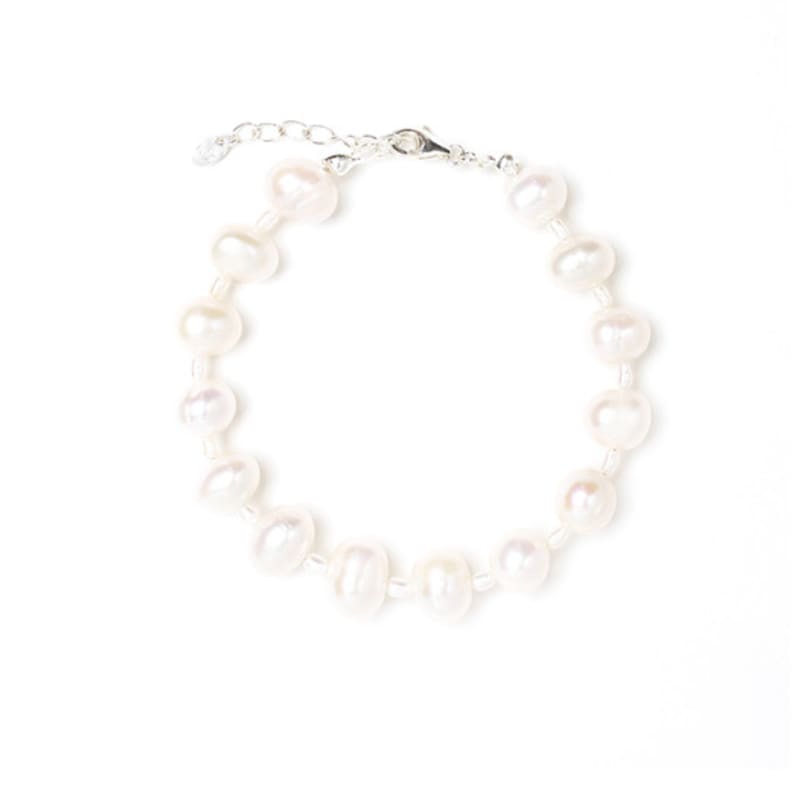 LAYERMOOD Ripple pearl BR gold
LAYERMOOD Ripple pearl BR gold