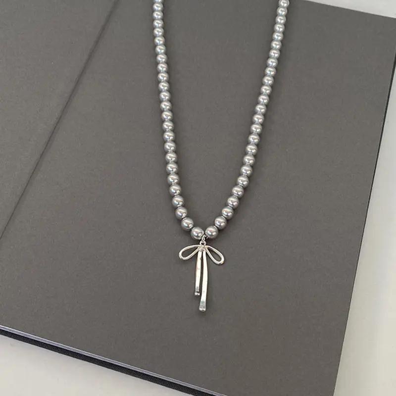 Fashion Grey Imitation Pearl Bow Tie Pendant Necklace for Women Simple Trend Jewelry срібний
Fashion Grey Imitation Pearl Bow Tie Pendant Necklace for Women Simple Trend Jewelry срібний